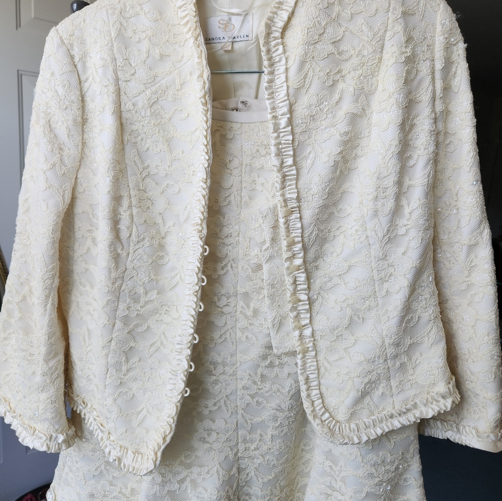 Women's Designer 2-PC suit, size 12 color Ivory.